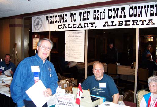Neil Probert, President Calgary Numismatic Society, Mark Mogen, Emily Richardson