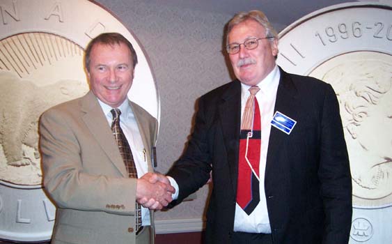 Ian Bennett, President and CEO of the Royal Canadian Mint and Charles Moore, President of the C.N.A. 