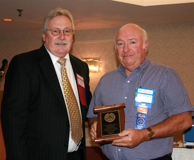 Geoff Bell receiving a Presidential Award for his ongoing support of the C.N.A.