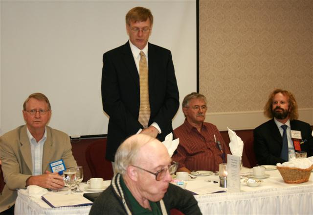 Cliff Beattie, Incoming President; Harold Brown, Outgoing President; Dick Dunn, Secretary CPMS and David Bergeron