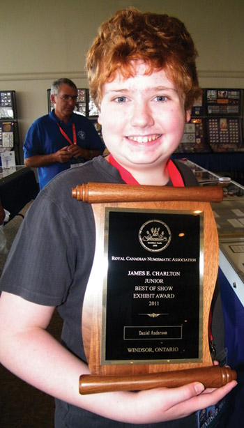 Daniel Anderson with his James E. Charlton Junior Exhibit Award