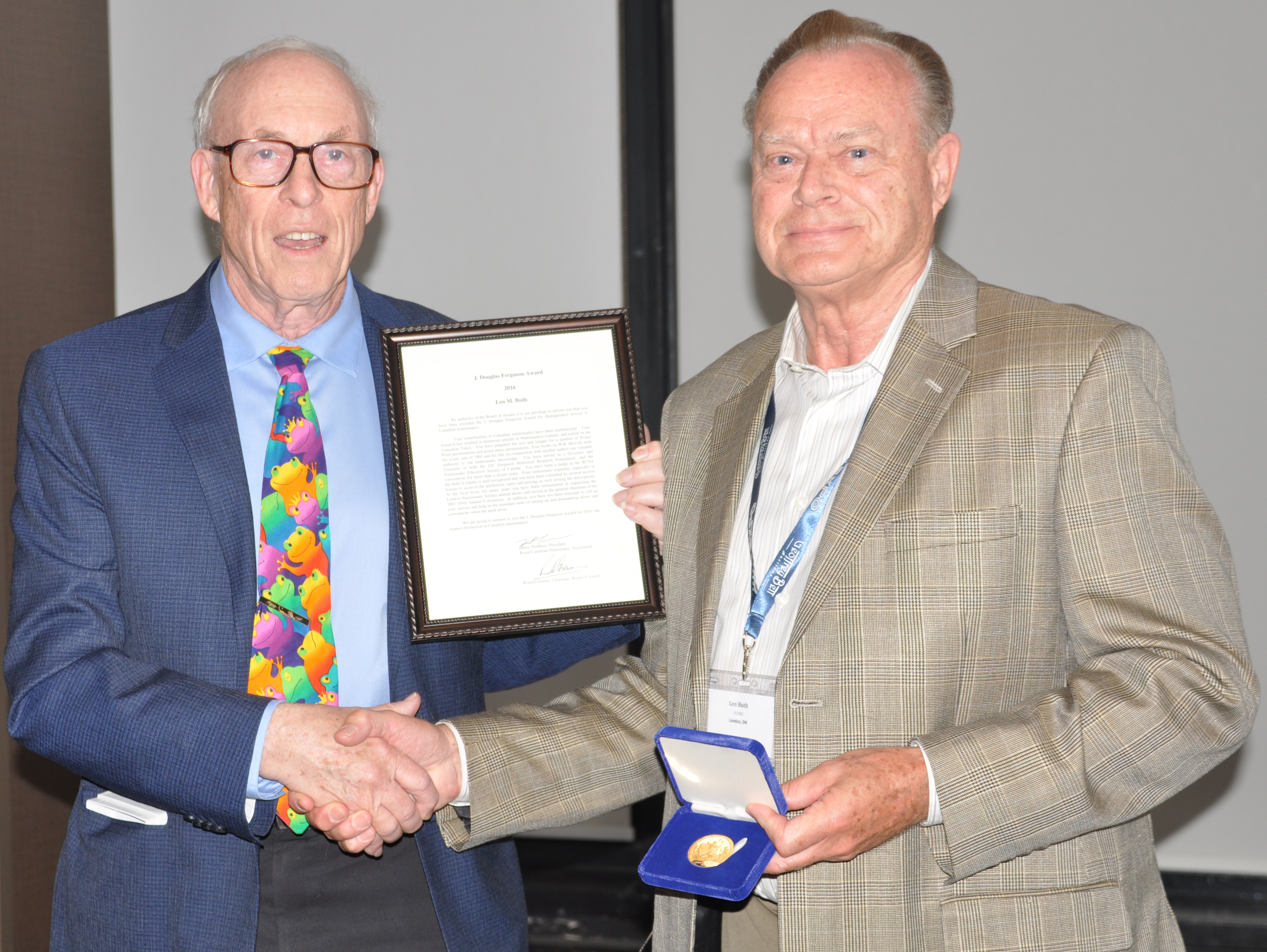<p><strong>Len Buth</strong> (right) receiving the J. Douglas Ferguson Award from <strong>Ron Greene</strong> (left).</p>
<p><small>Jeff Fournier photo</small></p>